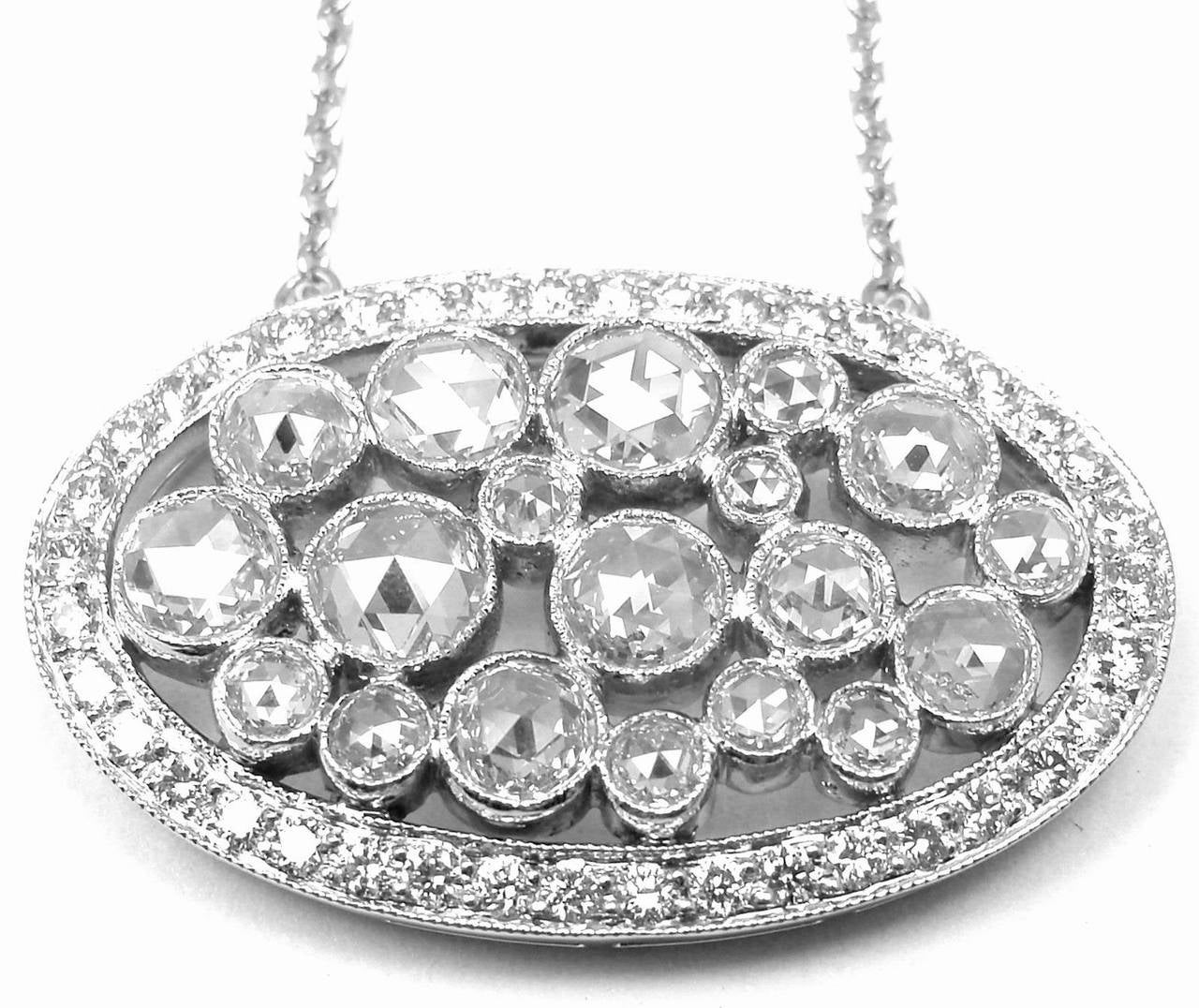 Platinum Diamond Cobblestone Pendant Necklace by Tiffany & Co.
With Rose-cut diamonds, carat total weight 1.03; round brilliant diamonds, carat total weight .27.

Details:
Weight: 7.7 grams
Length: 16