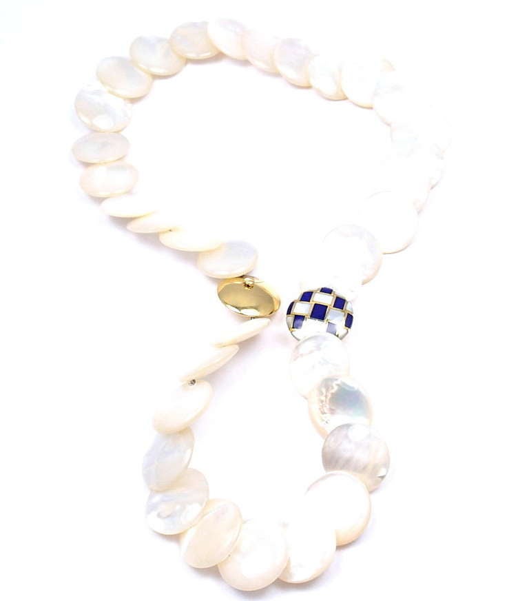 18k Yellow Gold Lapis Lazuli Mother Of Pearl Necklace by Tiffany & Co. 
With 34 mother of pearl beads 
1 gold bead
1 inlaid mother of pearl, lapis lazuli bead

Details: 
Length: 18