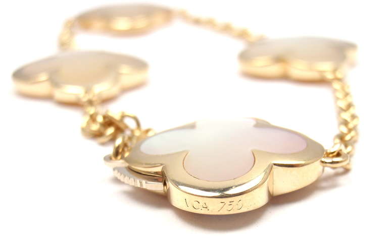 VAN CLEEF & ARPELS VCA Alhambra 18k Gelbgold Perlmutt-Armband. 
Mit 4 Alhambra-Motiven aus Perlmutt:: je 16 mm

Details: 
Länge: 6 3/4