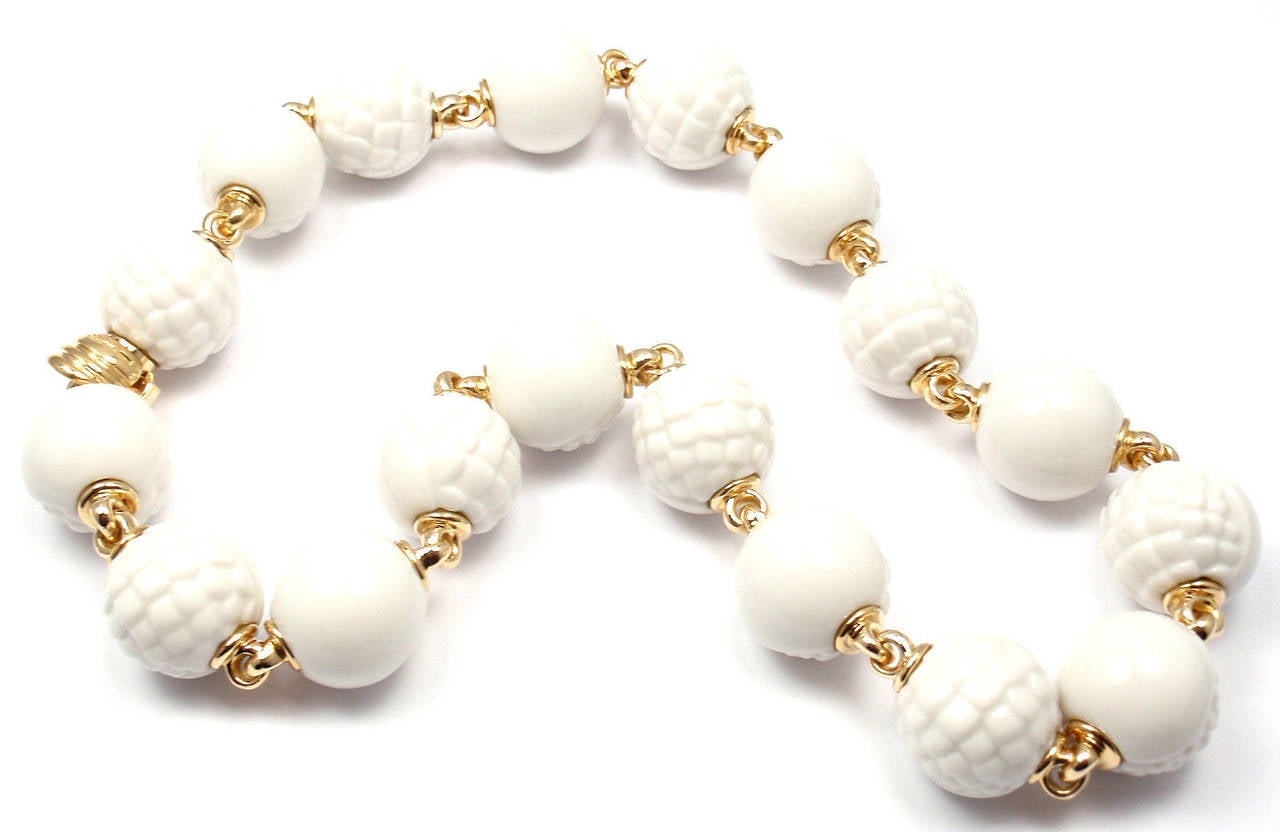 18k Yellow Gold Chandra White Porcelain Bead Necklace by Bulgari. 
With 18 round porcelain beads, 16.5mm each.

Details:
Necklace Length: 16