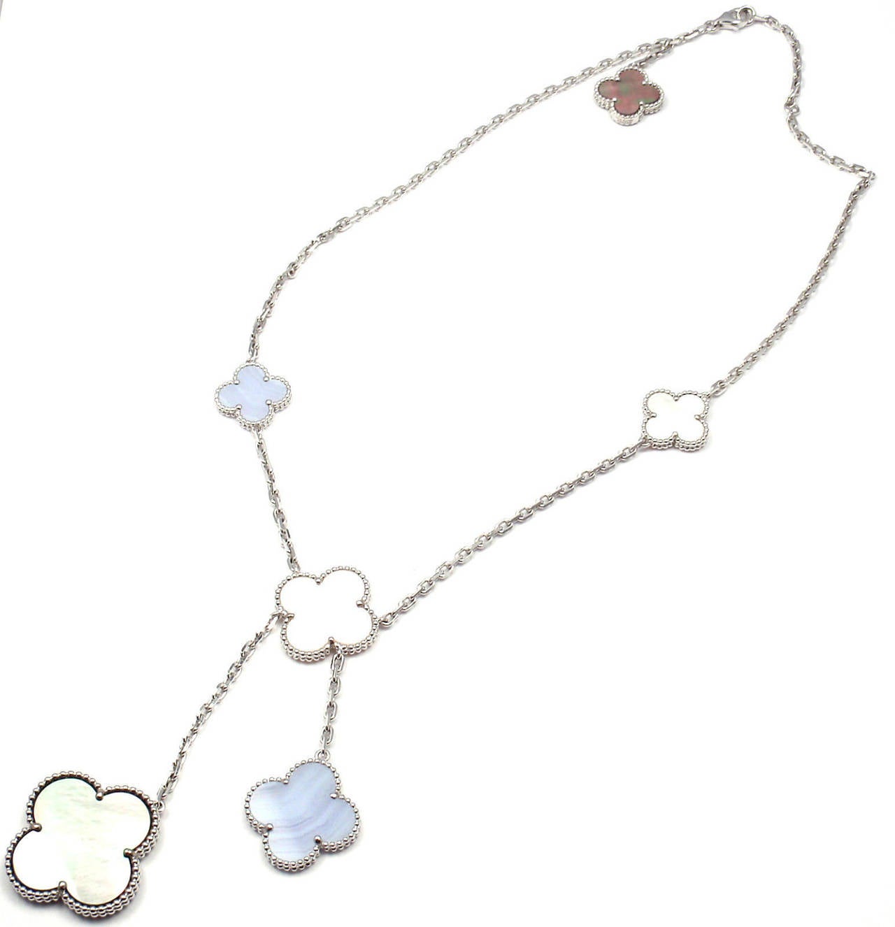 Van Cleef & Arpels Magic Alhambra 18k White Gold 6 Motif Chalcedony, White & Grey Mother of Pearl Necklace.
This necklace comes with VCA certificate.

Metal: 18k White Gold
Length: 16.5