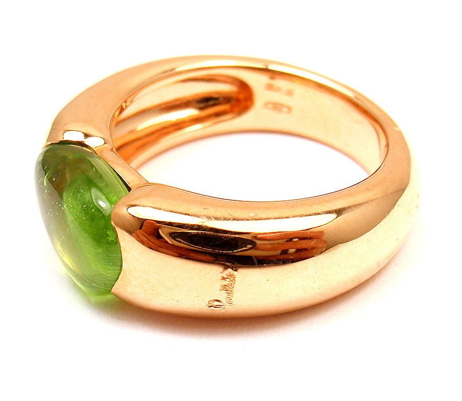 18k Yellow Gold Pear Shape Cabochon Peridot Sassi Ring
by Pomellato. 
With 1 Peridot 7.5mm x 9mm

Details:
Weight: 11.3 grams
Ring Size: 5
Width: 7.5mm
Stamped Hallmarks: Pomellato 750

*Free Shipping within the United States*

YOUR