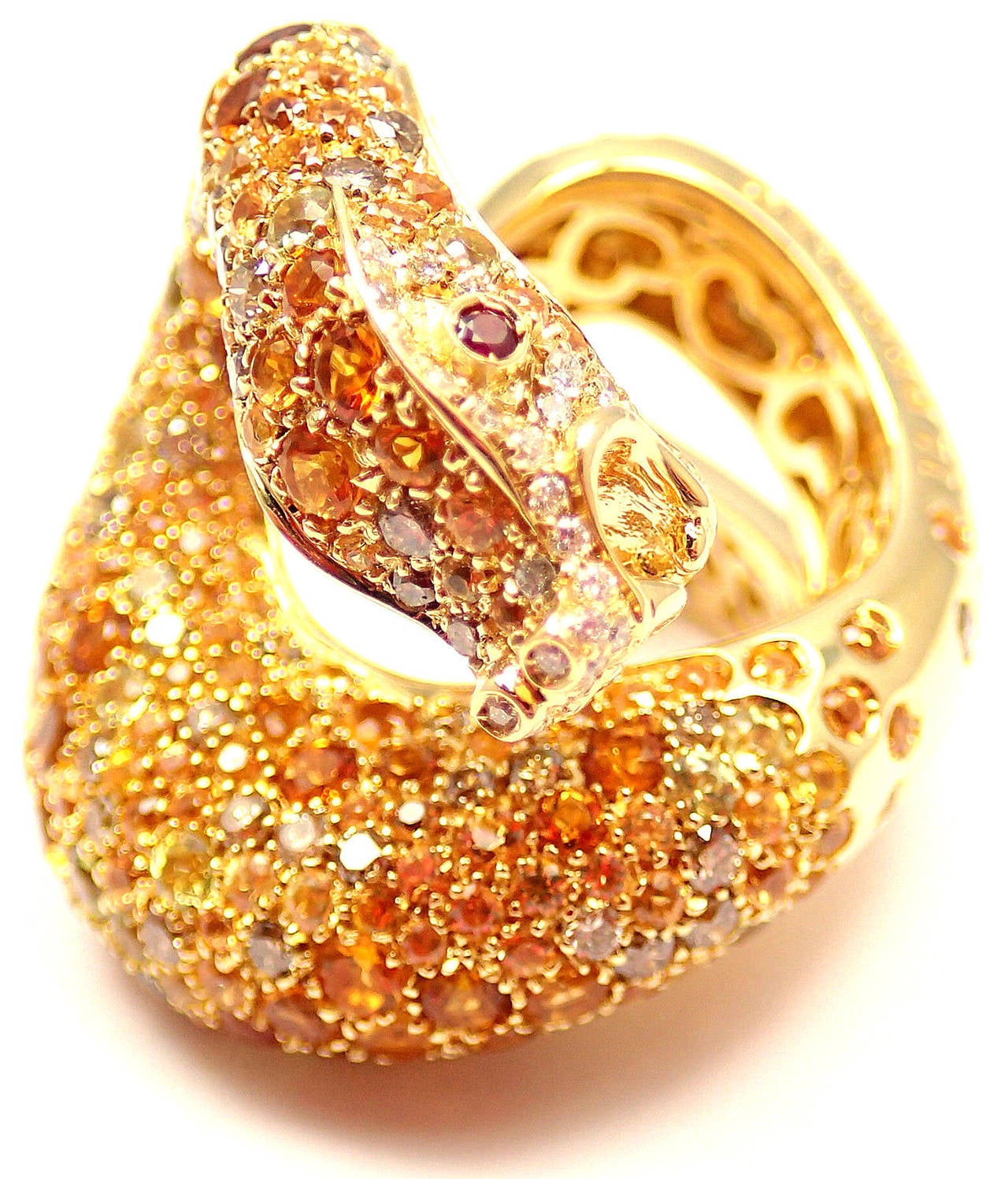 18k Yellow Gold IL PECCATO Sapphire Ruby Diamond Large nSnake Ring by 
Pasquale Bruni.
With Round Brilliant Cut Diamonds VS1 clarity, G color total weight 
approx. 2.01ct 
Sapphires 3.26ct.
Rubies: .05ct
This ring comes with Box, Certificate