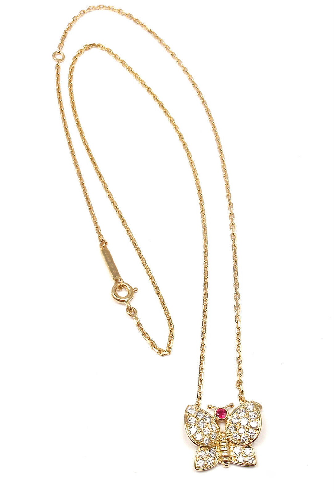 18k Yellow Gold Diamond Ruby Butterfly Necklace by Van Cleef & Arpels. 
With 30 brilliant round cut diamonds VVS1 clarity, F color
Total weight .70ct
1 ruby .10ct

Details: 
Length: 17''
Width: 2mm
Butterfly: 14mm x 16mm
Weight: 6.6