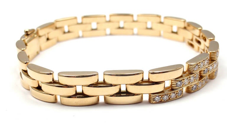 18k Yellow Gold Maillon Panthere Diamond 3 Row Link Bracelet by Cartier. This bracelet comes with an original Cartier box. 
With 48 round brilliant cut diamonds VVS1 clarity, F color total weight approx 1.20ct

Details:
Length: 7.5