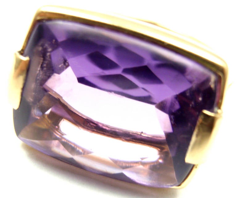 18k Yellow Gold Gold Amethyst Metropolis ring by Bulgari.
With 1 Amethyst 19mm x 14mm

Details:
Ring Size: 7 (resize available)
Width: 15mm
Weight: 11.5 grams
Stamped Hallmarks: Bulgari 750 Made in Italy 2337AL
*Free Shipping within the
