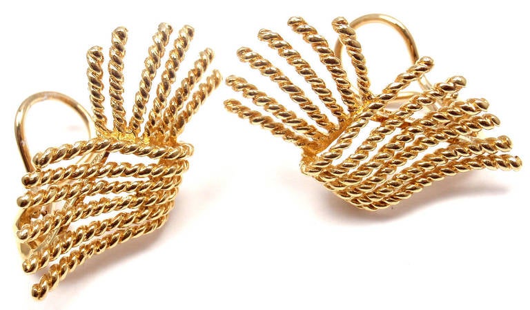 18k Yellow Gold Jean Schlumberger Rope Earrings by Tiffany & Co. 
These earrings are made for non pierced ears, but can be converted to pierced ears.

Details:
Measurements: 33mm x 20mm
Weight: 14 grams
Stamped Hallmarks:  Tiffany Schlumberger