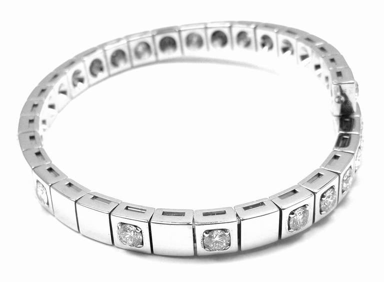 18k White Gold Diamond Nouvelle Vague Bracelet by Cartier.
With 21 round brilliant cut diamonds VVS1 clarity, G color total weight approximately 3ct

Details:
Length: 7