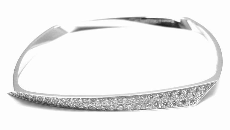 18k White Gold Diamond Bangle Bracelet by Frank Gehry for Tiffany & Co. WIth 44 round brilliant cut diamonds VS1 clarity, G color total weight approximately 1.10ct

Details: 
Length: 6.75