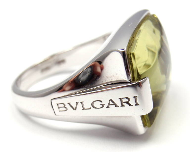 18k White Gold Gold Citrine Metropolis ring by Bulgari.
With 1 Citrine 19mm x 14mm

Details:
Ring Size: 6 1/4 (resize available)
Width: 15mm
Weight: 11.7 grams
Stamped Hallmarks: Bulgari 750 Made in Italy 2337AL
*Free Shipping within the