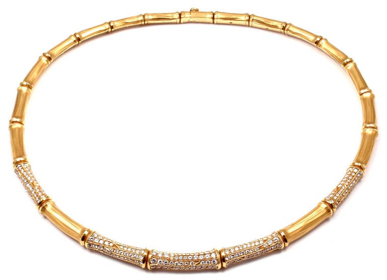 18k Yellow Gold Diamond Bamboo Necklace by Cartier.
With 315 Round brilliant cut diamonds VVS1 clarity F color Total Diamond Weight approx. 9ct

This necklace comes with original Cartier box.

Details:
Length: 19
