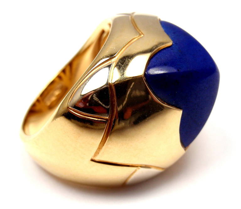 18k Yellow & White Gold Lapis Lazuli Pyramid Ring by Bulgari. 
With one Lapis Lazuli 12mm x 12mm

Details: 
Ring Size: 6.5
Weight: 17 grams
Stamped Hallmarks: Bulgari 750
*Free Shipping within the United States*

YOUR PRICE: $3,000