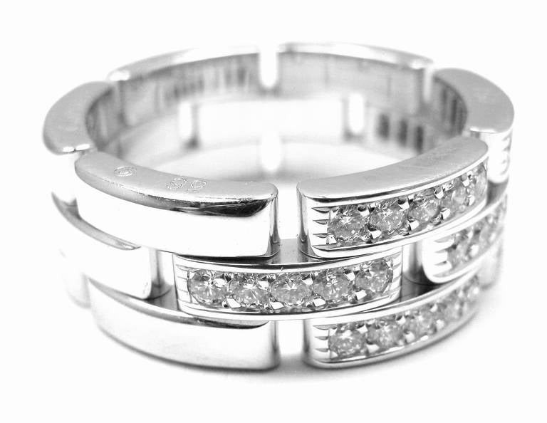 18k White Gold Maillon Panthere Diamond Band Ring by Cartier.
With 35 round brilliant cut diamonds VS1 clarity, G color total weight approx. .59ct
This ring comes with original Cartier box.

Details:
Size:  7 1/4 US, Europe 56
Width: