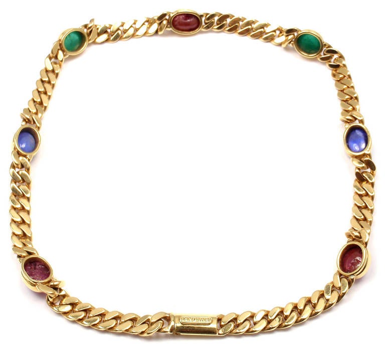 18k Yellow Gold Ruby Sapphire & Emerald Link Necklace by Bulgari. 
This necklace comes with an original Bulgari box. 
With 3 oval cabochon rubies total weight approx. 5ct
2 oval cabochon sapphires total weight approx. 4ct
2 oval cabochon