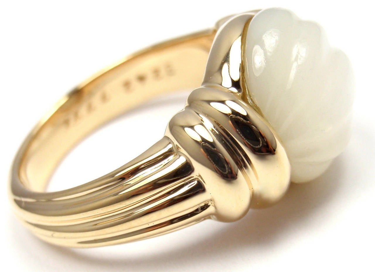 18K Yellow Gold Mother of Pearl Ring by Boucheron. 
With Mother of Pearl 12mm.

Details: 
Size: 7
Width: 12mm 
Weight: 11.3 grams
Stamped Hallmarks: Boucheron 750 B2427774
*Free Shipping within the United States*

YOUR PRICE: $2,000