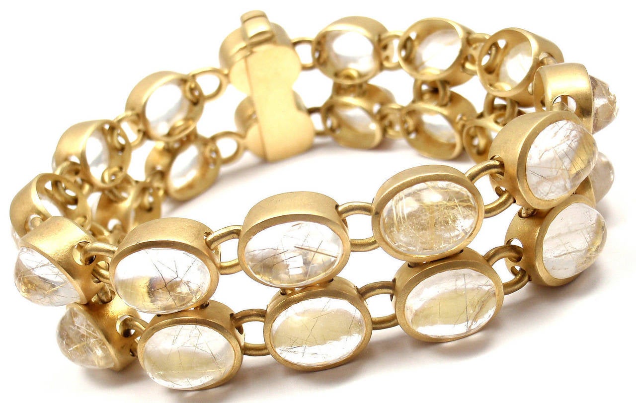 18k Yellow Gold Rutilated Quartz Link Bracelet by H. Stern. 
With 26 oval  cabochon rutilated quartz stones 
10mm x 7mm each

Details: 
Length: 6.5