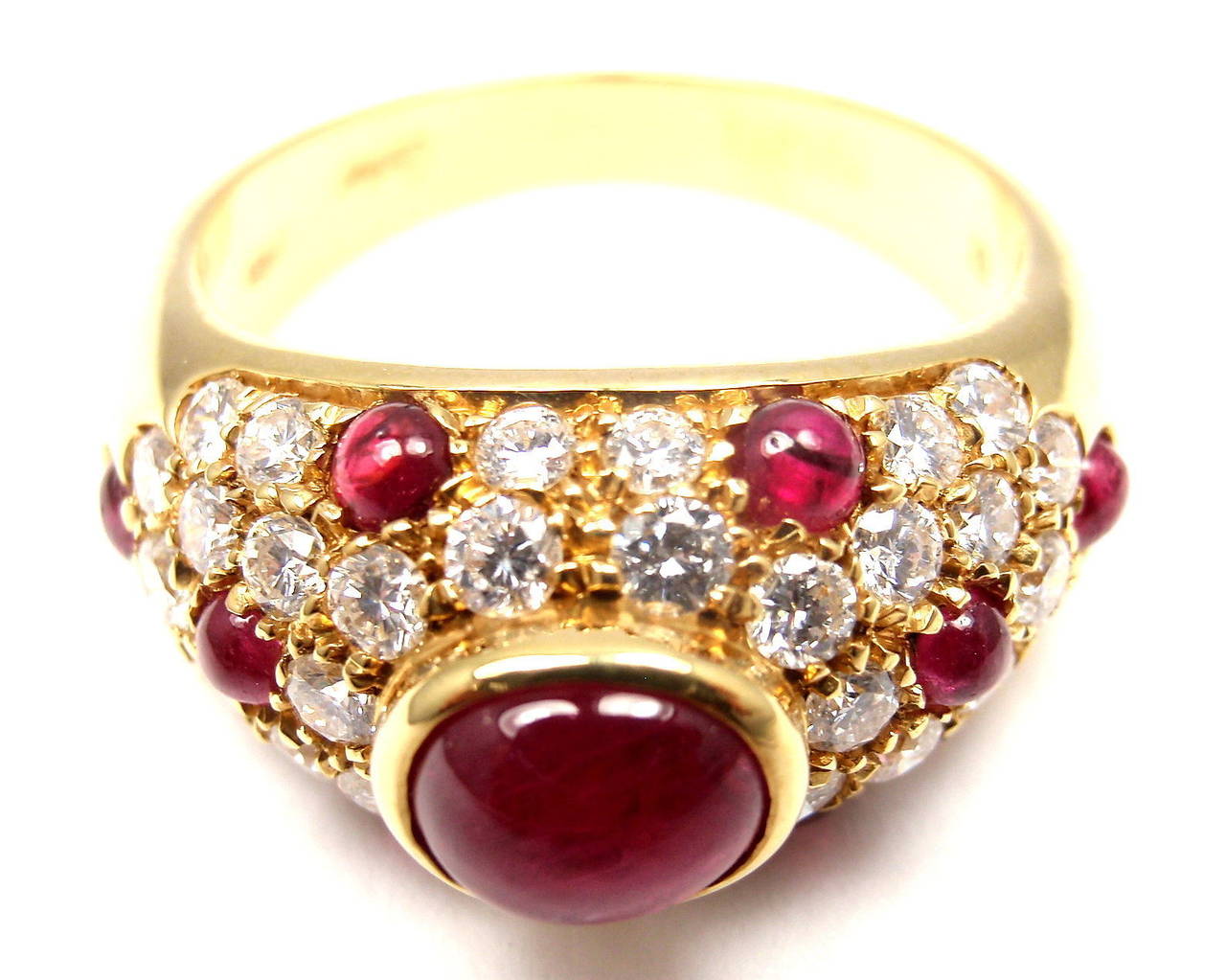 18k Yellow Gold Diamond and Cabochon Ruby Ring by Cartier. 
Part of Cartier's stunning 