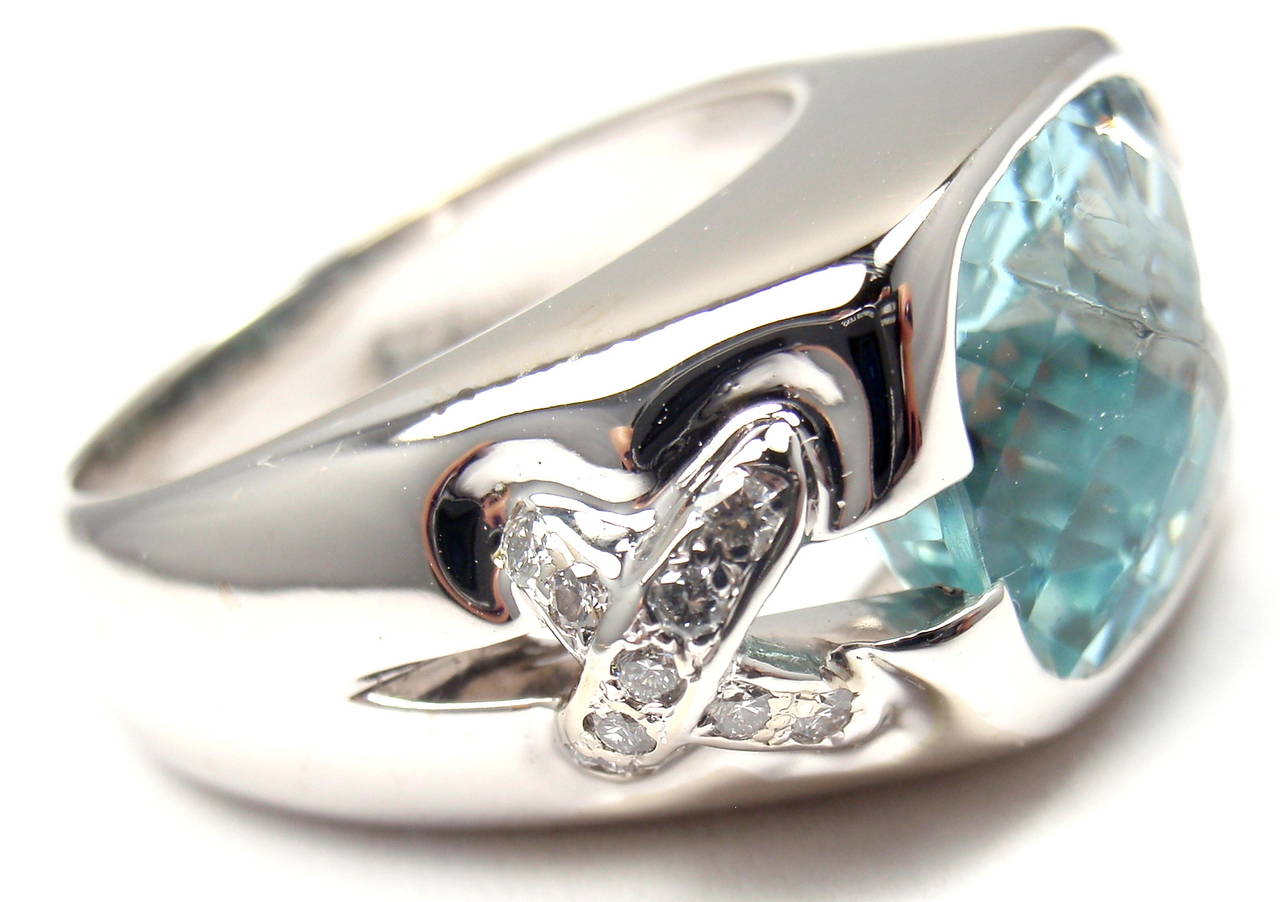 18k White Gold Aquamarine Diamond Ring by Tiffany & Co. 
With 1 Aquamarine 12mm x 13mm approx. 5ct
18 round brilliant cut diamonds VS1 clarity, G color total weight approx. .27ct

Details: 
Ring Size: 6.5, can be resized.
Weight: 14.6