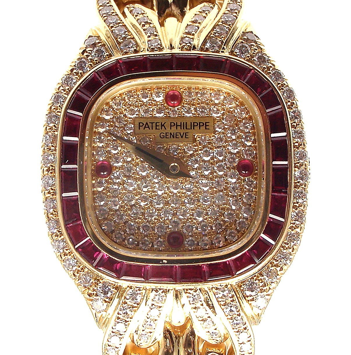Patek Philippe Lady's 18k Yellow Gold, Diamond and Ruby La Flamme Bracelet Watch, Ref. 4806/011J. 

This watch is unworn and comes with all the papers and a PP box.

With 28 rubies baguettes total weight .95ct
32 diamonds VVS1 clarity, E color