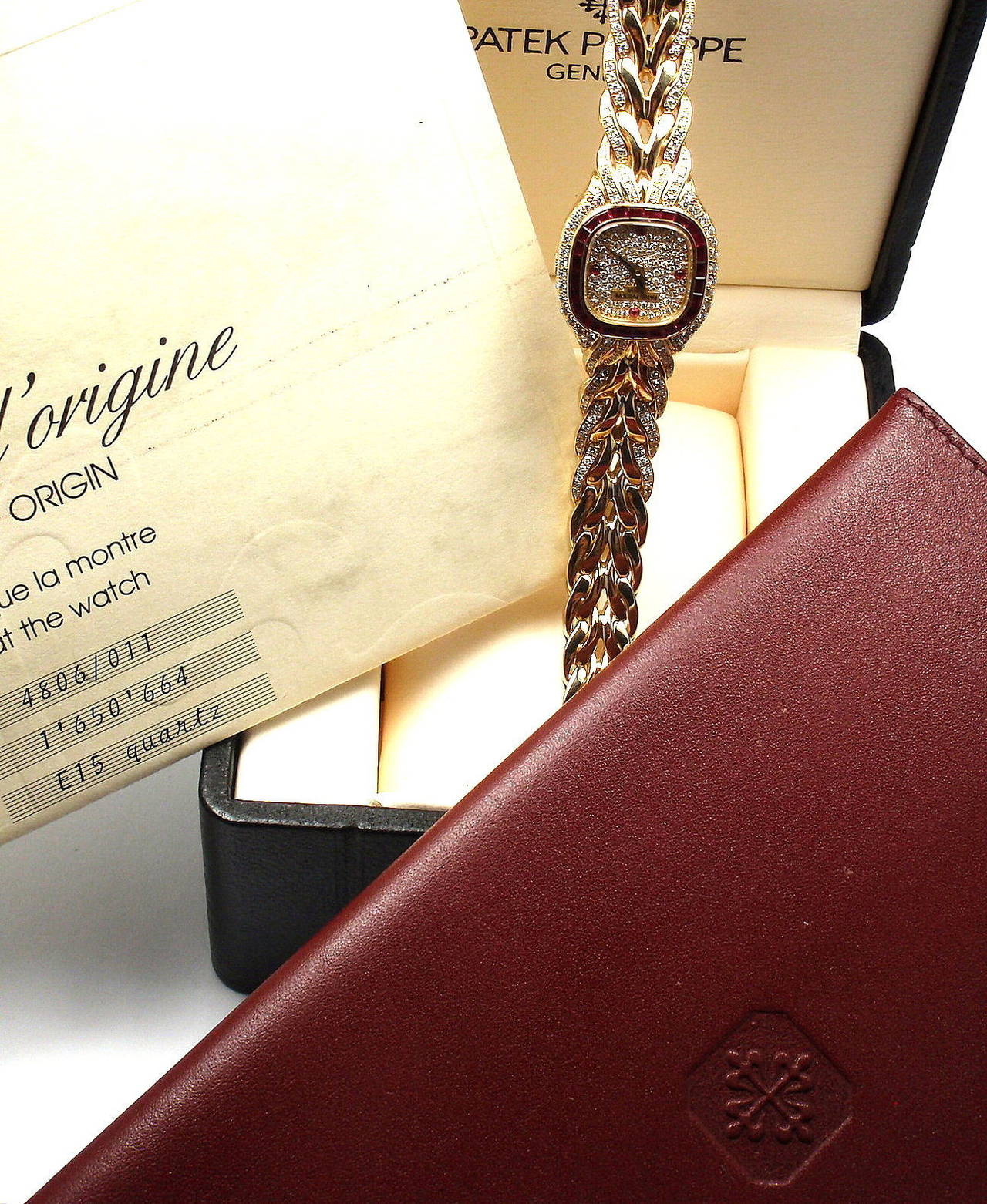 Patek Philippe Lady's Yellow Gold, Diamond and Ruby La Flamme Bracelet Watch In New Condition In Holland, PA