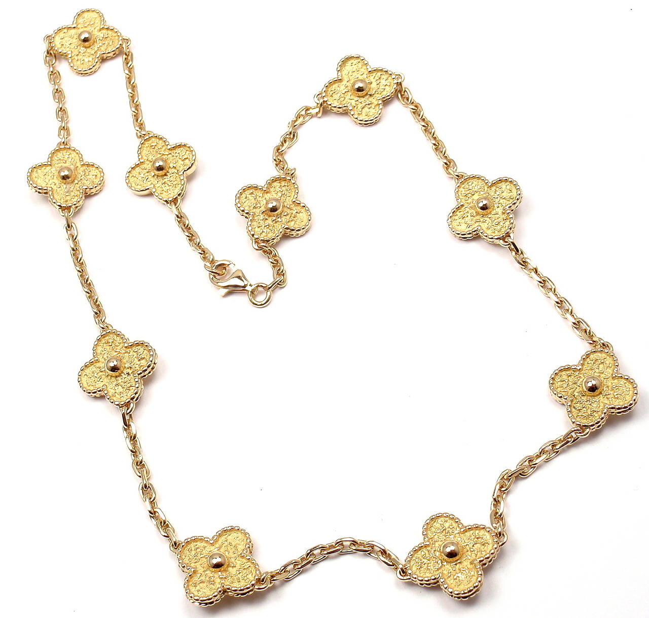 18k Yellow Gold Vintage Alhambra 10 Motif Necklace by Van Cleef & Arpels. 
This necklace comes with VCA service certificate from Van Cleef & Arpels store.

Details: 
Length: 16.5