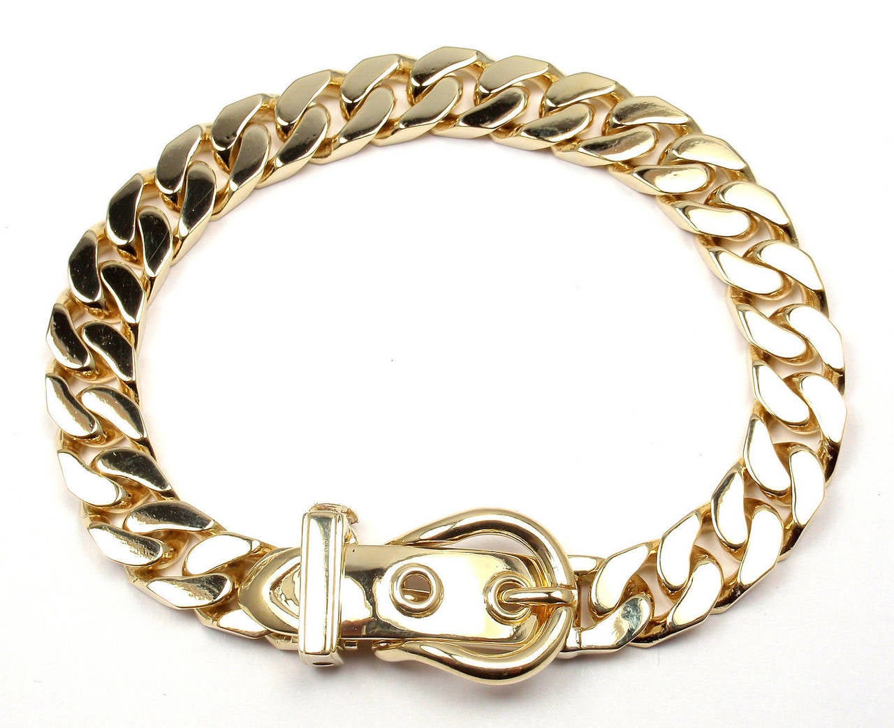 18k Yellow Gold Curb Link Chain Large Buckle Bracelet by Hermes. 

Details: 
Length: 8