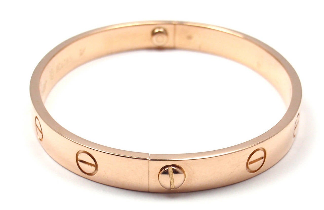 gold bracelet with circle and line through it