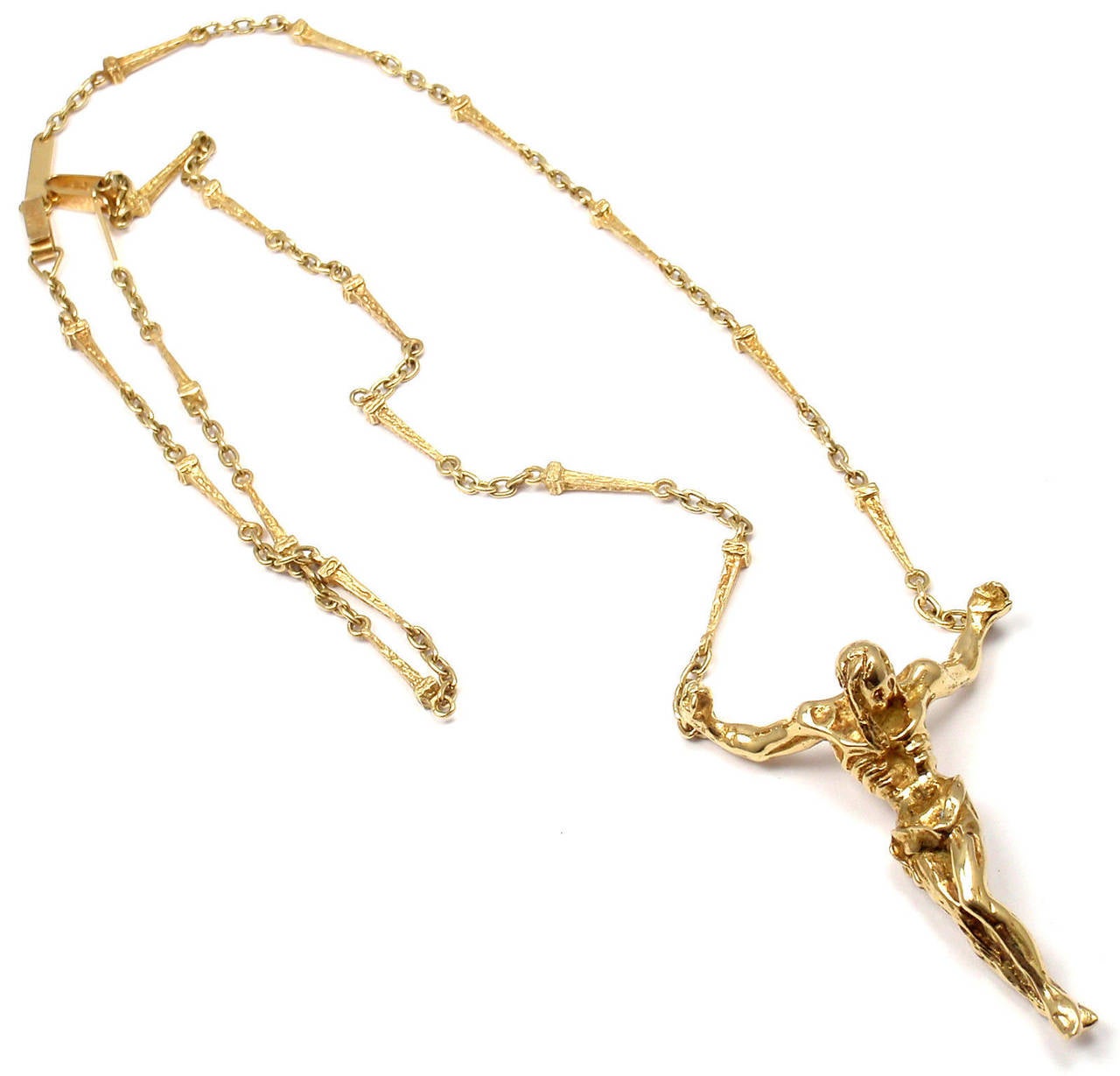 Limited Edition 18k Yellow Gold Salvador Dali Large Christ Saint John On The Cross Bracelet Necklace Set. 
This is a limited edition numbered piece from 1970's, number 104 out of 1000 ever made.
Accompanying card from Exmundart.

Details: