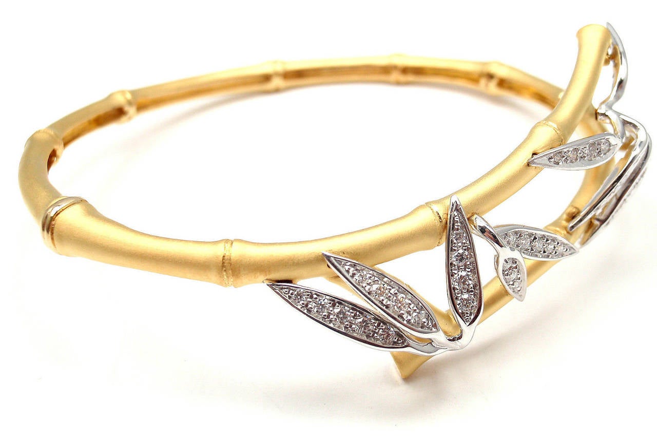 18k Yellow Gold Diamond Bangle Bracelet by Carrera Y Carrera from Bambu collection.
With 37 square cut diamonds VS1 clarity, G color total weight approx. .35ct

This bracelet comes with Box Certificate and Tag.

Details:
Length: 	7