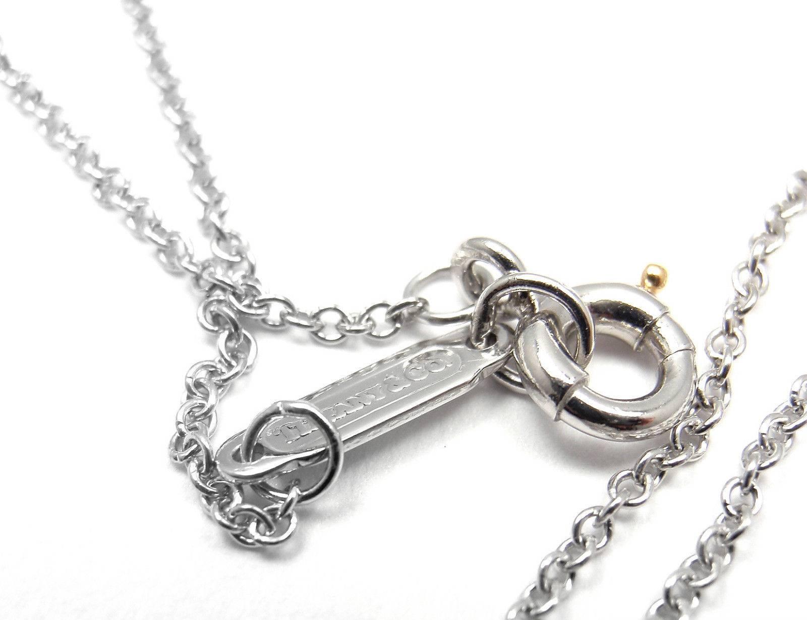 Tiffany & Co. Diamond Platinum Oval Key Pendant Necklace In New Condition In Holland, PA