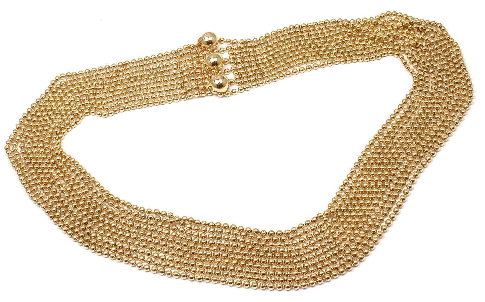 18k Yellow Gold Draperie de Decollete 10 Strand Necklace by Cartier.

This necklace comes with original Cartier box.

Details:
Length: 14 Inches - 19 Inches
Width: 1 inch
Weight: 100.0 grams
Stamped Hallmarks: Cartier 750 825712
*Free