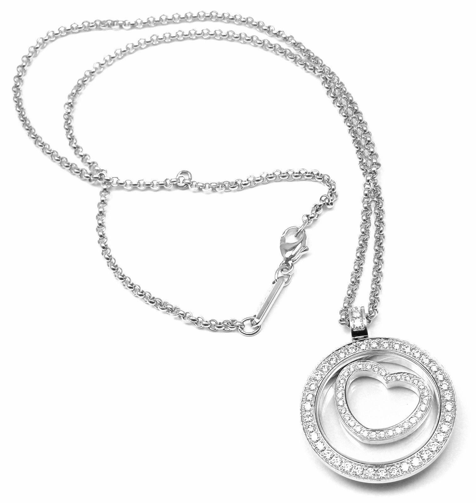 18k White Gold Diamond Floating Heart Necklace by Chopard. 
With 72 Total Diamonds, VS1 Clarity, G Color. Total Diamond Weight: 1.20CT. 

Details: 
Chain Length: 16.5