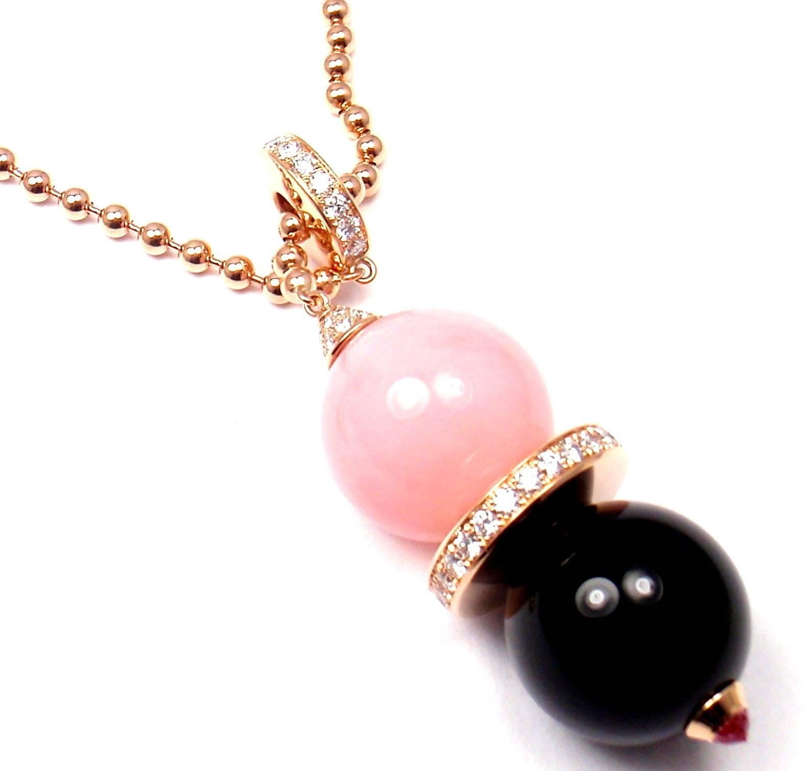 18k Rose Gold Diamond Pink Opal Black Onyx And Pink Sapphire Évasions Joaillières Larial Necklace by Cartier.
With 56 round brilliant cut diamonds VVS1 clarity,
E color
1 large 16mm onyx bead
1 large 16mm pink opal bead
1 pink sapphire 
This