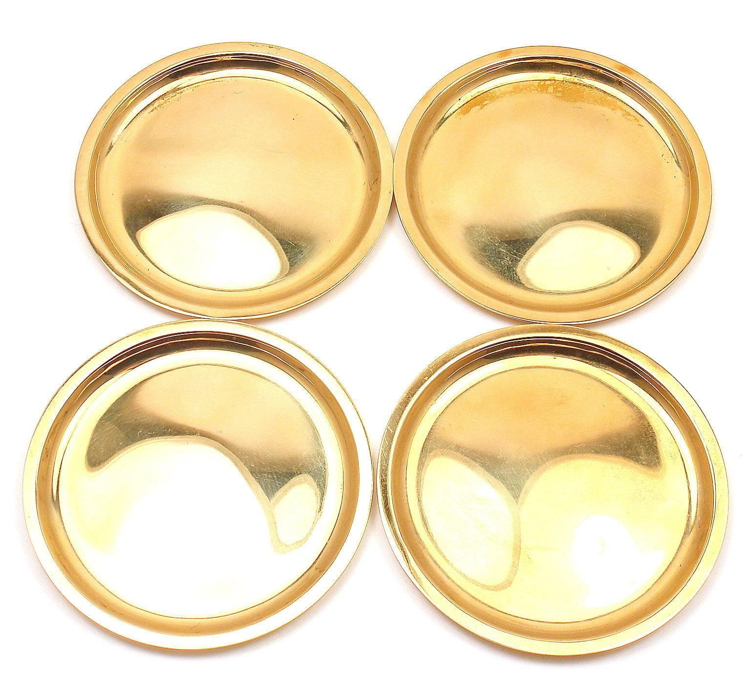 18k Solid Yellow Gold Set of Four Vintage Coasters by Cartier.

Details:
Measurements: each coaster 2.65 inches
Weight:  117 grams
Stamped Hallmarks: each coaster is signed Cartier 18k

*Free Shipping within the United States*

Your Price: