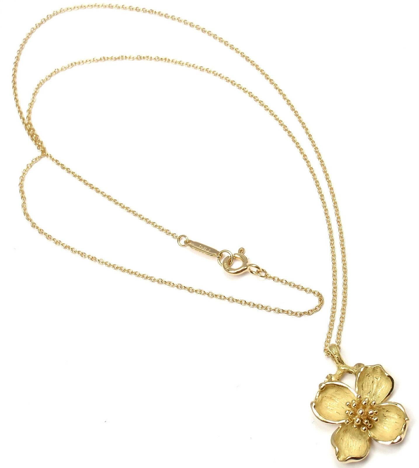 18k Yellow Gold Dogwood Flower Pendant Necklace by Tiffany & Co.

Details:
Weight: 5.8 grams
Length: 18