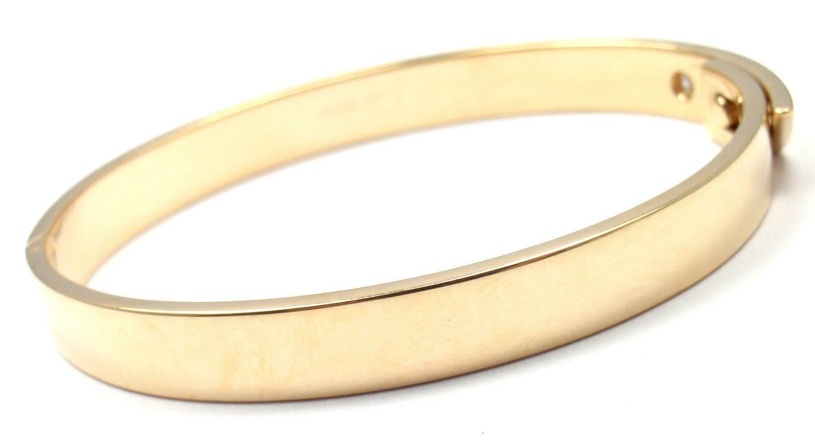 18k Yellow Gold Diamond Anniversary Bangle Bracelet By Cartier. 
 Size 16. 
 This bracelet comes with an original Cartier box. 
 With 1 round brilliant cut diamond VS1 clarity, G color total weight .10ct

 Details: 
 Size: 16
 Width: 7mm
