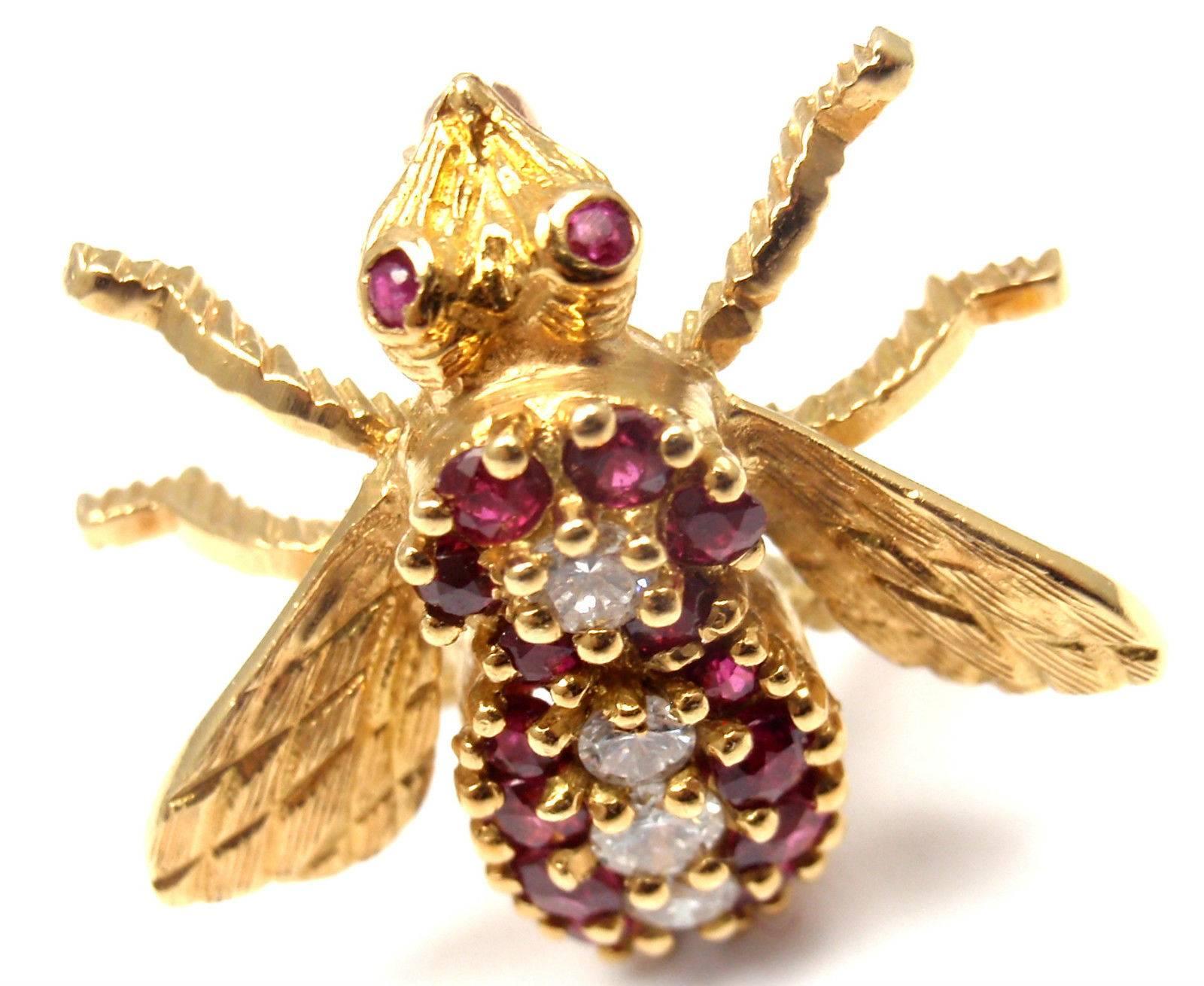 18k Yellow Gold Diamond Ruby Bee Pin Brooch by Herbert Rosenthal.
With 5 round brilliant cut diamonds VS1 Clarity, G Color 
total weight approx. .35ct
12 round rubies

Details:
Measurements Brooch: 23mm x 22mm
Ring Size: 7
Weight: 13.8