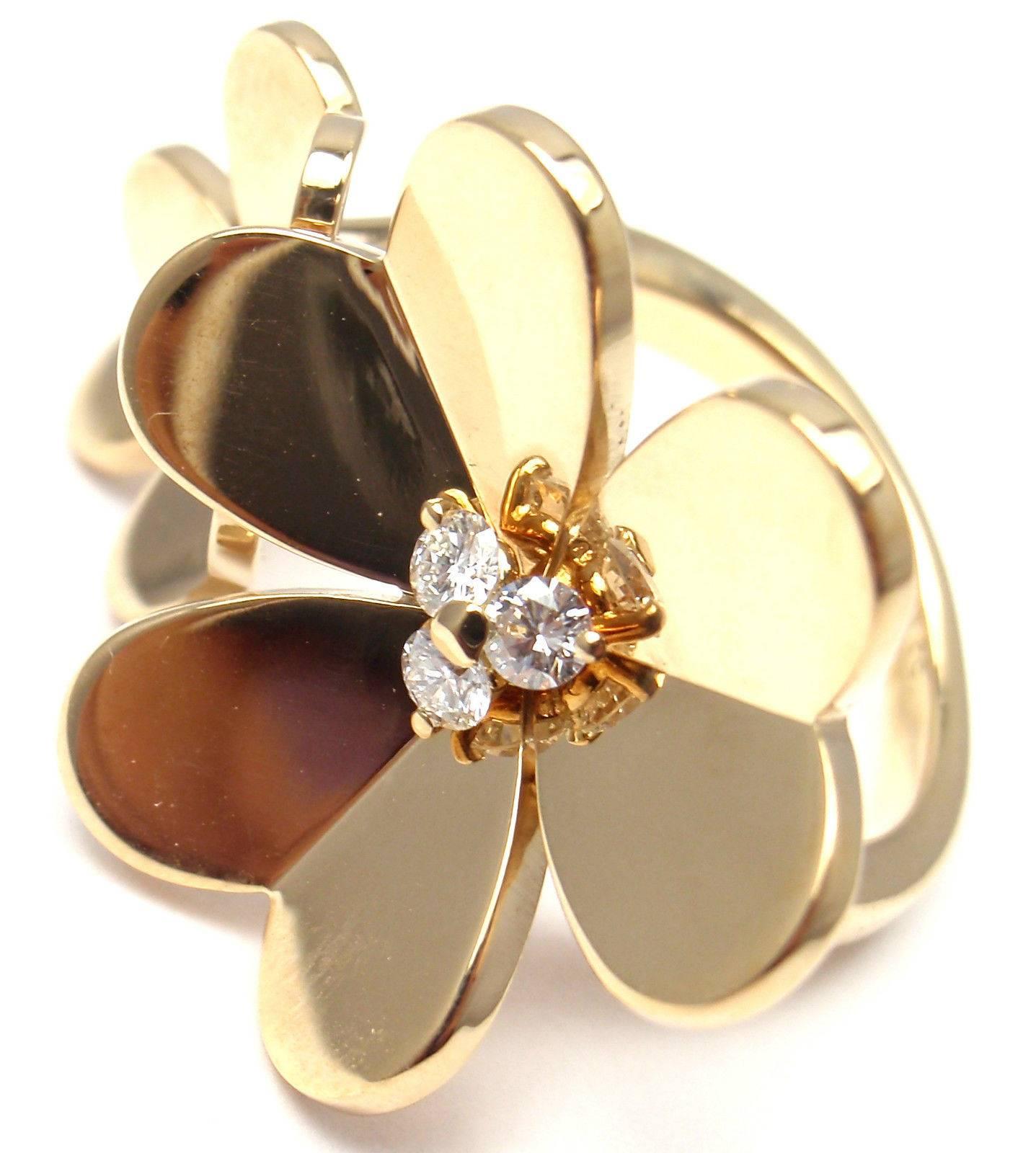 18k Yellow Gold Frivole Diamond Between The Finger Flower Ring by 
Van Cleef & Arpels. 

With 4 round brilliant cut diamond VS1 clarity, G color total weight .25ct
This ring comes with Van Cleef & Arpels certificate.

Details:
Weight: 11.9