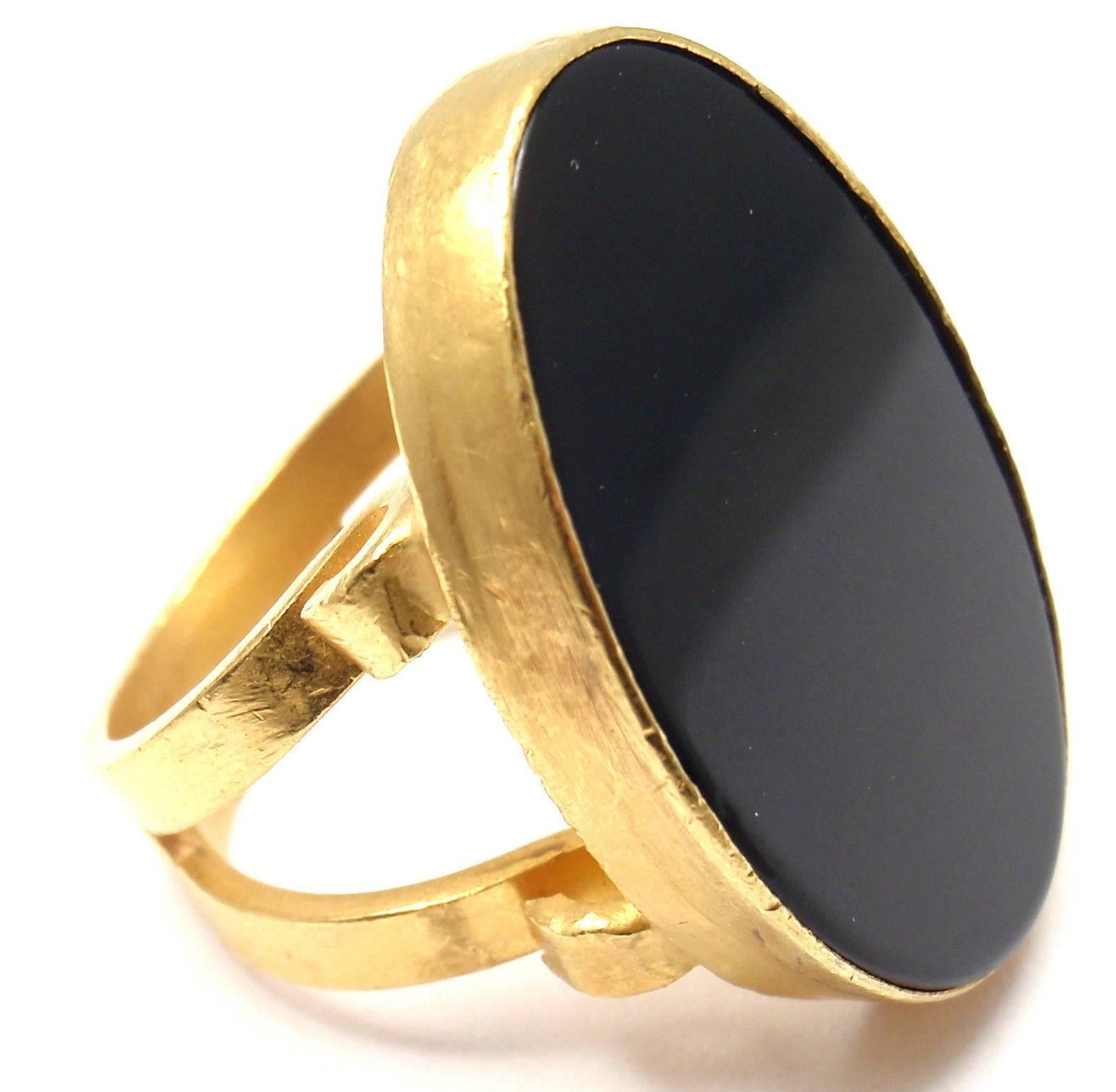 24k Yellow Gold Large Black Onyx Ring by Yossi Harari.  
With 1 large oval black onyx 30mm x 22mm
Details:  
Ring Size: 6.5 
Weight: 20.6 grams 
Width: 30mm 
Stamped Hallmarks: Yossi 24k 

*Free Shipping within the United States*

YOUR