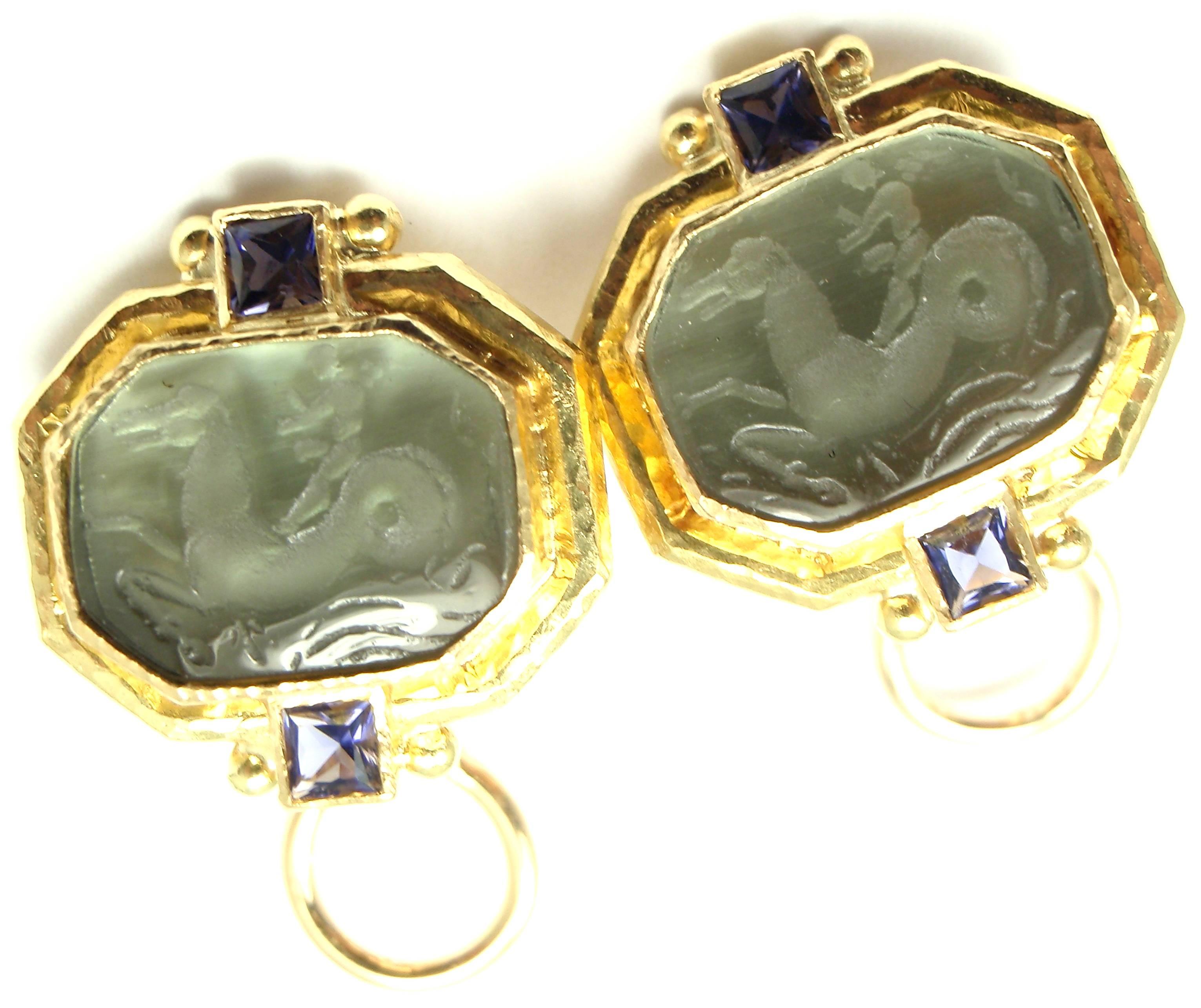 19k Yellow Gold Venetian Glass Intaglio Iolite Earrings by Elizabeth Locke. 
With venetian green glass intaglio of a horse and 4 iolites

Details:
Measurements: 20mm x 20mm
Weight: 17.1 grams
Backs: Collapsible posts with omega backs
Stamped
