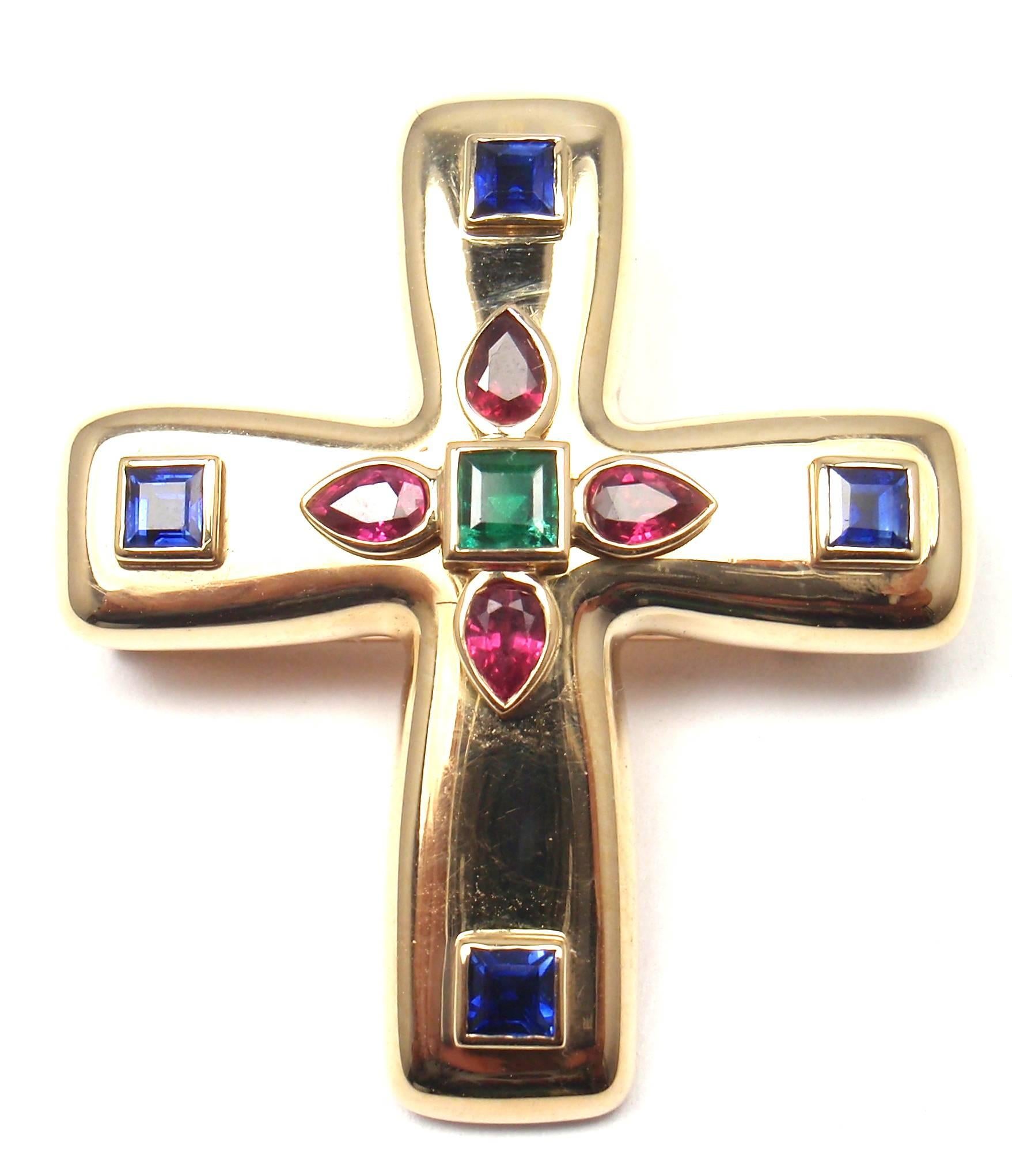 18k Yellow Gold Vizantija Cross Sapphire, Ruby and Emerald Pendant Brooch by Cartier. 

With 4 Princess Cut Sapphires, 4 Pear Shape Rubies,
1 Emerald

Details: 
Measurements:	1.5