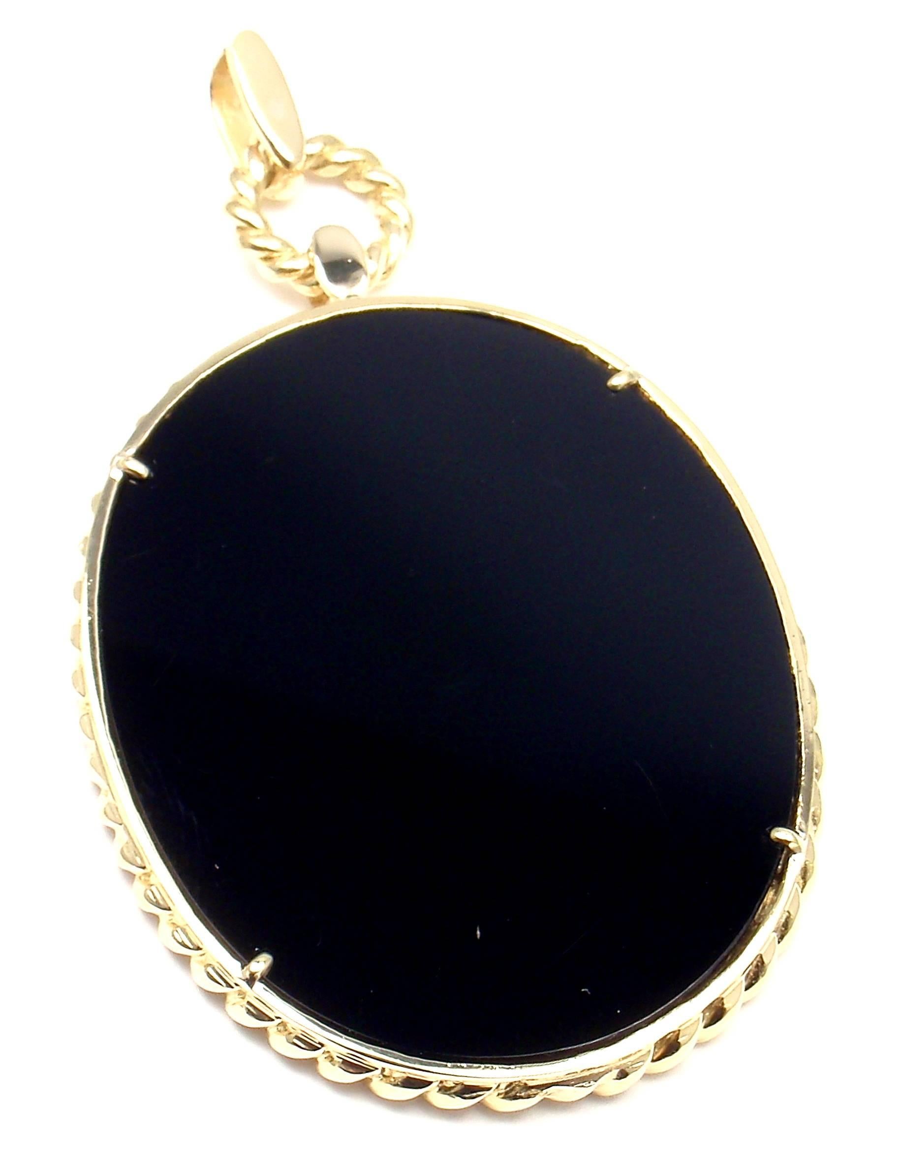 18k Yellow Gold Black Onyx Diamond Pendant by Van Cleef & Arpels.
With 26 round brilliant cut diamonds VVS1 clarity, E color total weight 
approx. 1ct

Details:
Measurements: 3