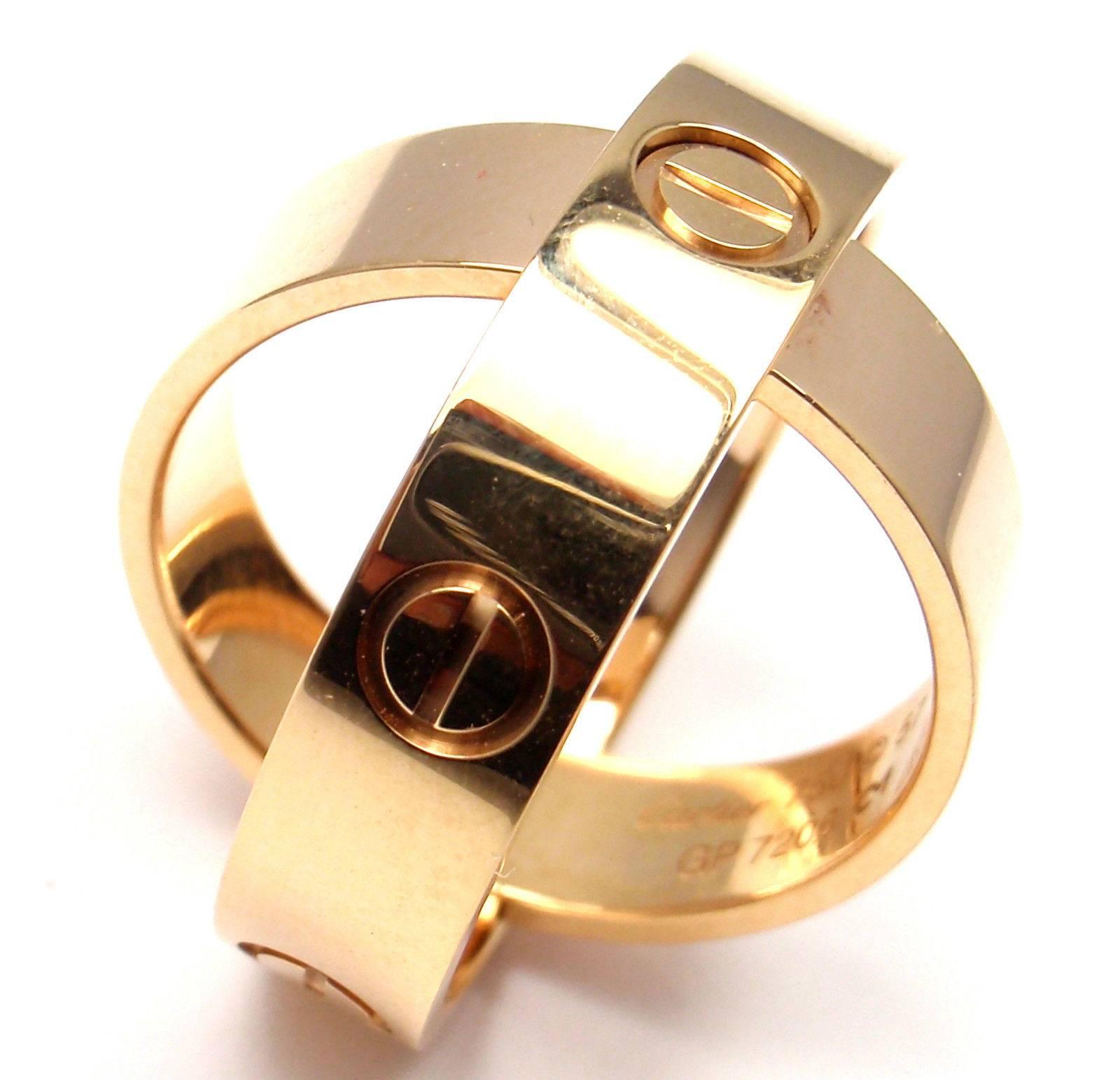 18k Yellow Gold Combination Love Band Ring and Pendant by Cartier.
This ring is in mint condition and comes with Cartier box and Cartier certificate.

 Details:
Ring Size: European 57 US 8
Band Width: 6mm
Weight: 11.5 grams
Stamped Hallmarks:
