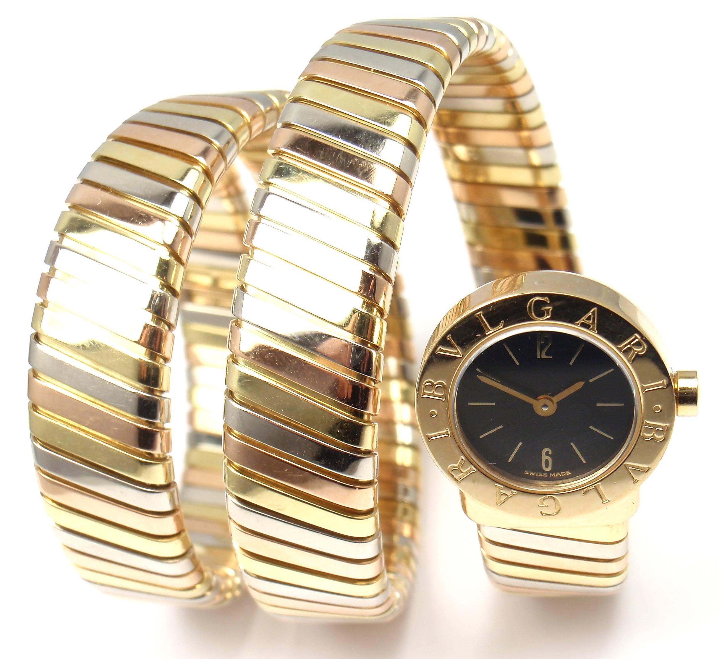 Bulgari lady's 18k tri-color gold (yellow, white, rose) Tubogas serpent bracelet watch. 
This watch comes with an original Bulgari box.

Details:
Movement Type: Quartz
Case Size: 3/4