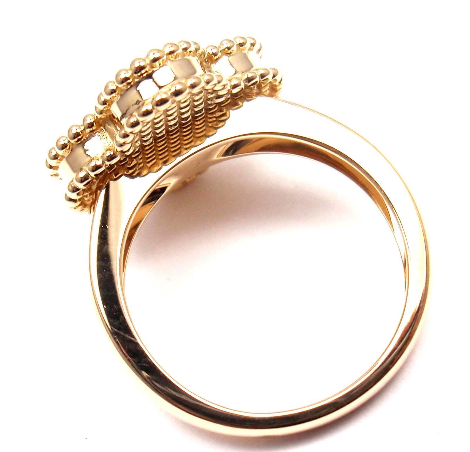 18k Yellow Gold Diamond Mother Of Pearl Vintage Alhambra Ring by  Van Cleef & Arpels. 
With 1 Round brilliant cut diamond .06ct F/VS1 Alhambra cut mother of pearl.  
Details:
Size: Size - 4 3/4 US, 49 European
Width: 15mm 
Weight: 6.3 grams
Stamped