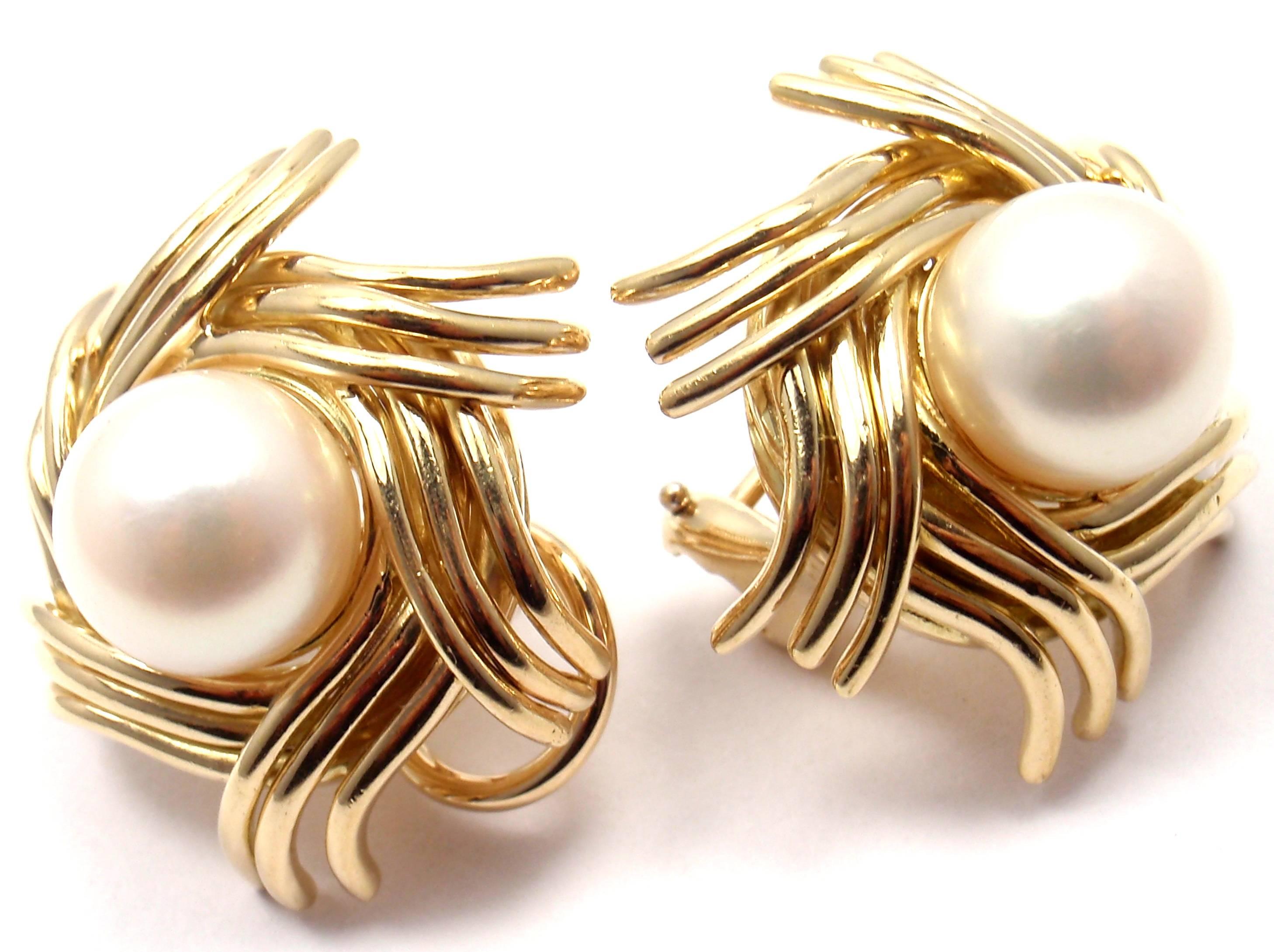18k Yellow Gold Pearl by Jean Schlumberger Earrings for Tiffany & Co. 
With two 9mm cultured pearls. 
These earrings are for pierced ears.

Details: 
Length: 23mm
Width: 22mm
Weight: 22.5 grams
Stamped Hallmarks: Tiffany & Co Schlumberger