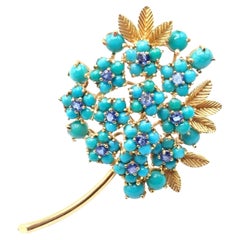 Broche Tiffany & Co en or jaune, avec turquoise et saphir