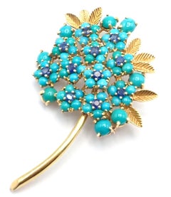 Broche Tiffany & Co en or jaune, avec turquoise et saphir