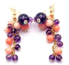 Boucles d'oreilles Cartier « Délices de Goa » en or rose, corail et diamants
