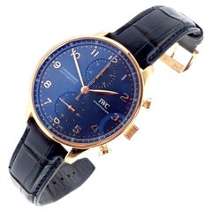 Montre IWC Portugieser Chronographe en or rose, bleu marine, fond squeletté, référence IW371614